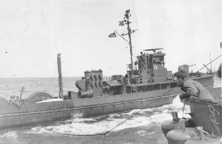 Lelean Carl Swift of the YMS-385